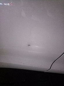 汽车门刮伤修多少钱