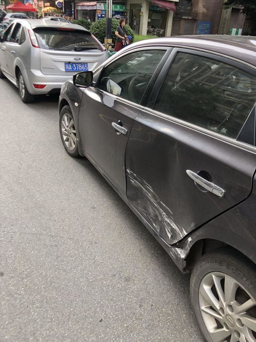 汽车门板金修复多少钱