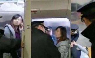 女子伸腿阻止高铁关门被行拘 女子伸腿阻止高铁关门被行拘