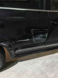 汽车车门被刮了修多少钱(汽车车门被刮了修多少钱—解析汽车刮擦修复成本与因素)