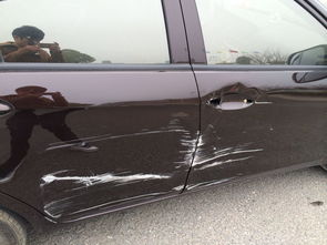 汽车前后门划痕多少钱修(汽车前后门划痕修复费用解析)