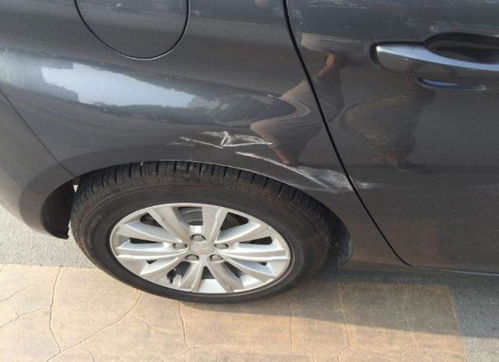 汽车右后轮刮擦多少钱修(汽车右后轮刮擦修复费用详解)