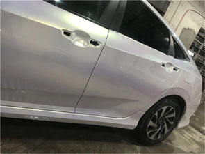 汽车后盖刮掉漆要多少钱(汽车后盖刮掉漆修复费用解析)