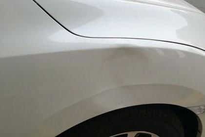 汽车后轮漆凹陷多少钱修(汽车后轮漆凹陷修复费用解析)