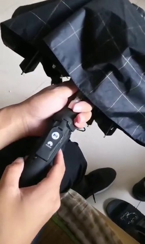 华为手机怎么拍雨伞