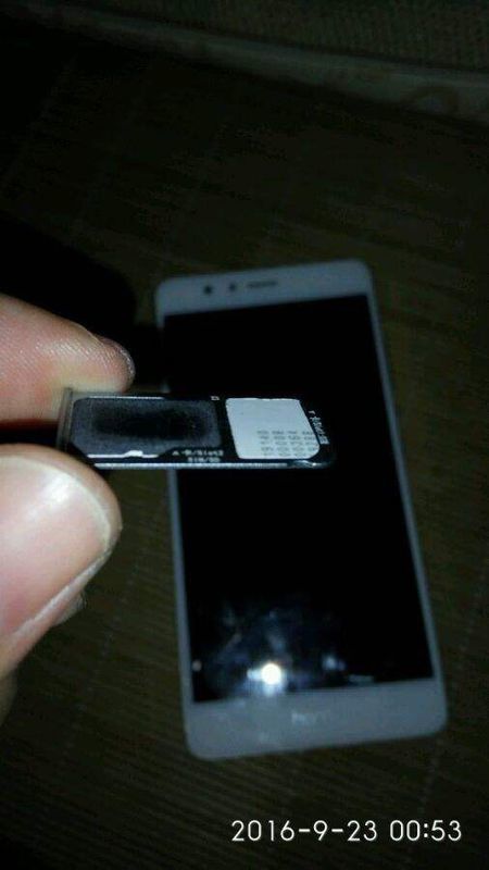 旧版手机华为怎么插卡