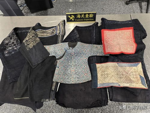 外籍旅客带少数民族服装出境被拦 外籍旅客带少数民族服装出境被拦